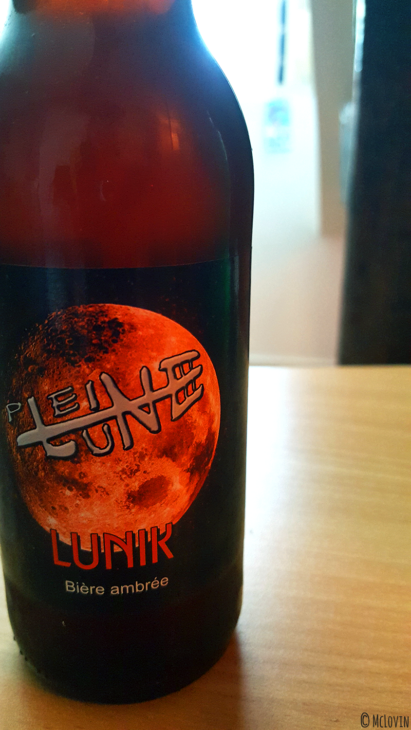 Bouteille de bière ambrée Lunik de la brasserie de la Pleine Lune
