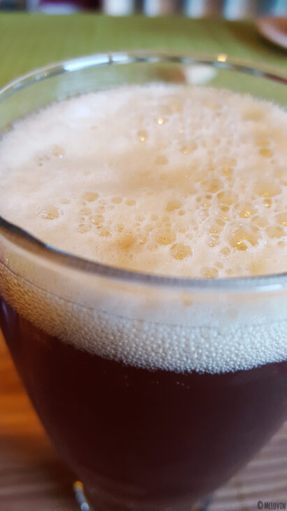 Bière IPA Corne du Diable de la brasserie canadienne et québécoise Dieu du Ciel ! servie dans un verre avec de la mousse !